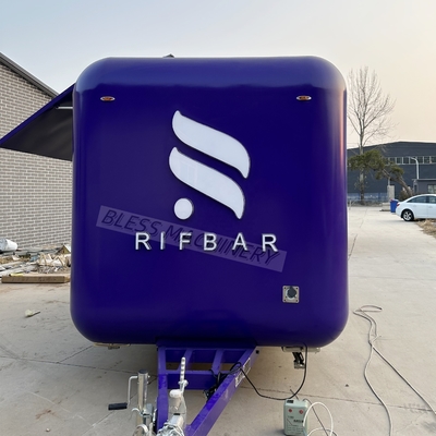 Voedseltrailer van roestvrij staal met displaykoelkast en vierwielervoedselverwarmer